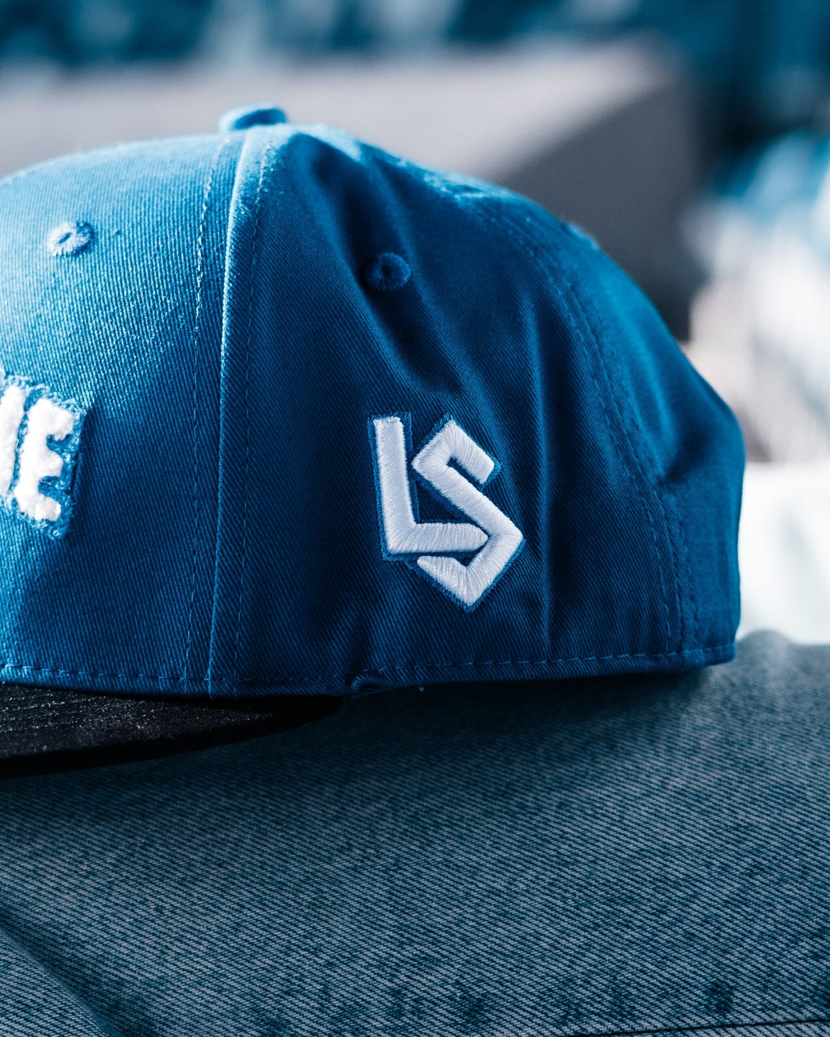 Black and blue flat cap